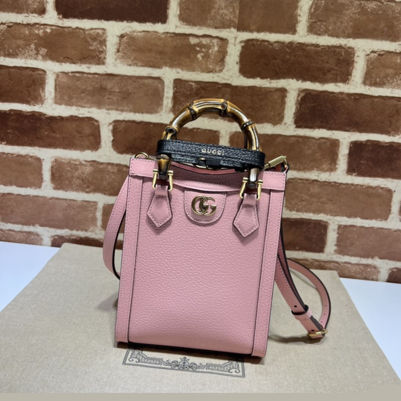 G*u*i top handle bags